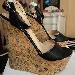 Brand new in box.  Cork sole summer wedges.